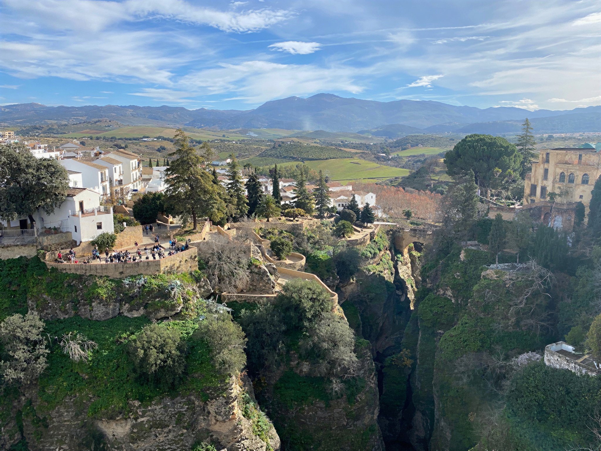 A sharp and clear photo of a town on a cliff after being fixed by the AI photo enhancer.